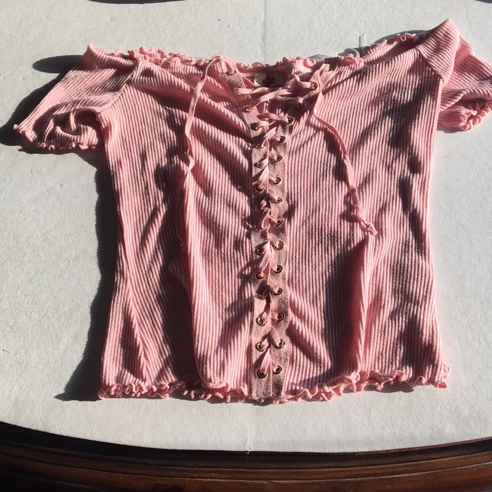 A light pink off the shoulder shirt:)